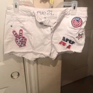 Cute white jean shorts with Patriot  stickers